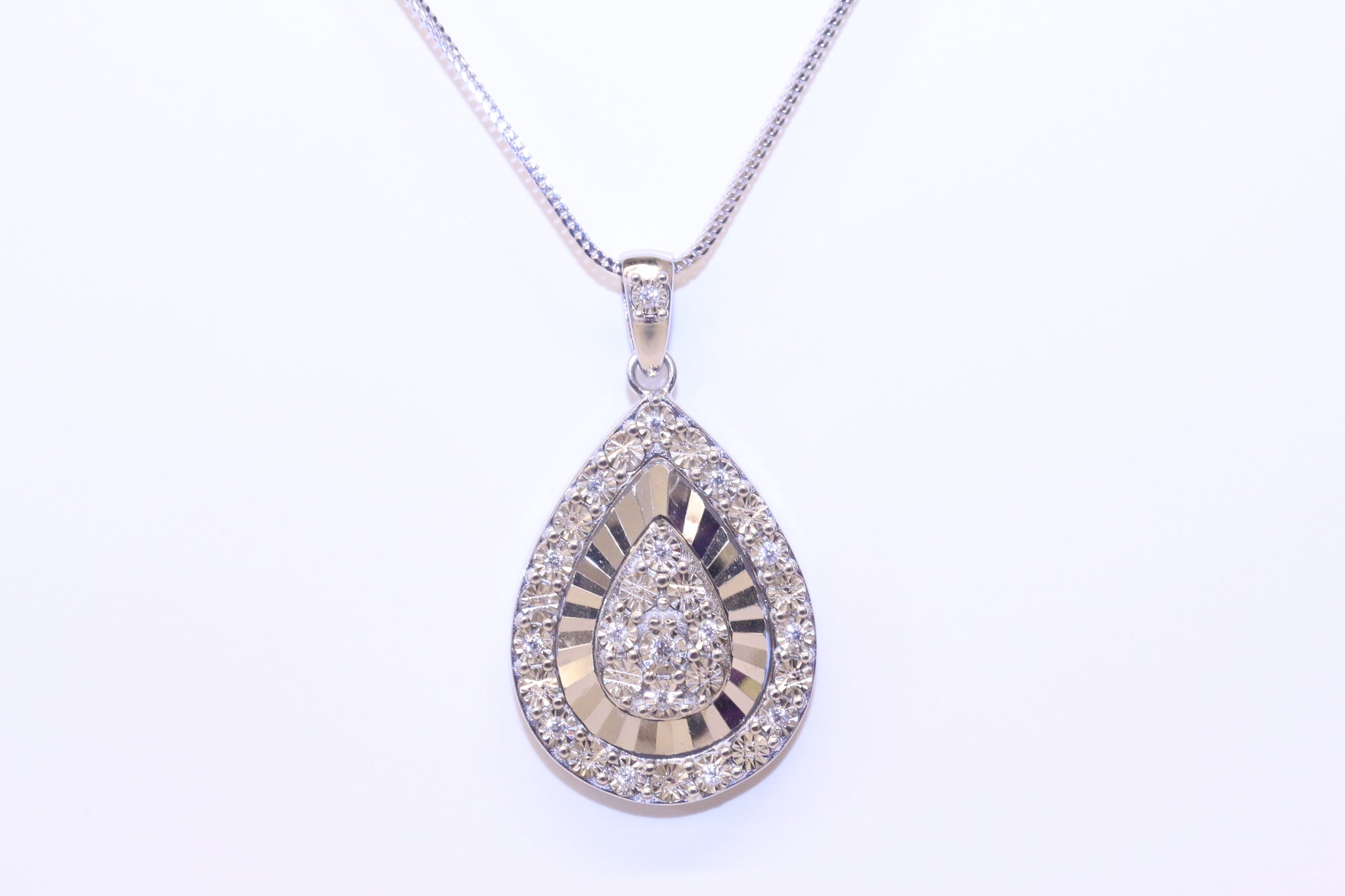 DIAMOND PENDANT IN STERLING SILVER