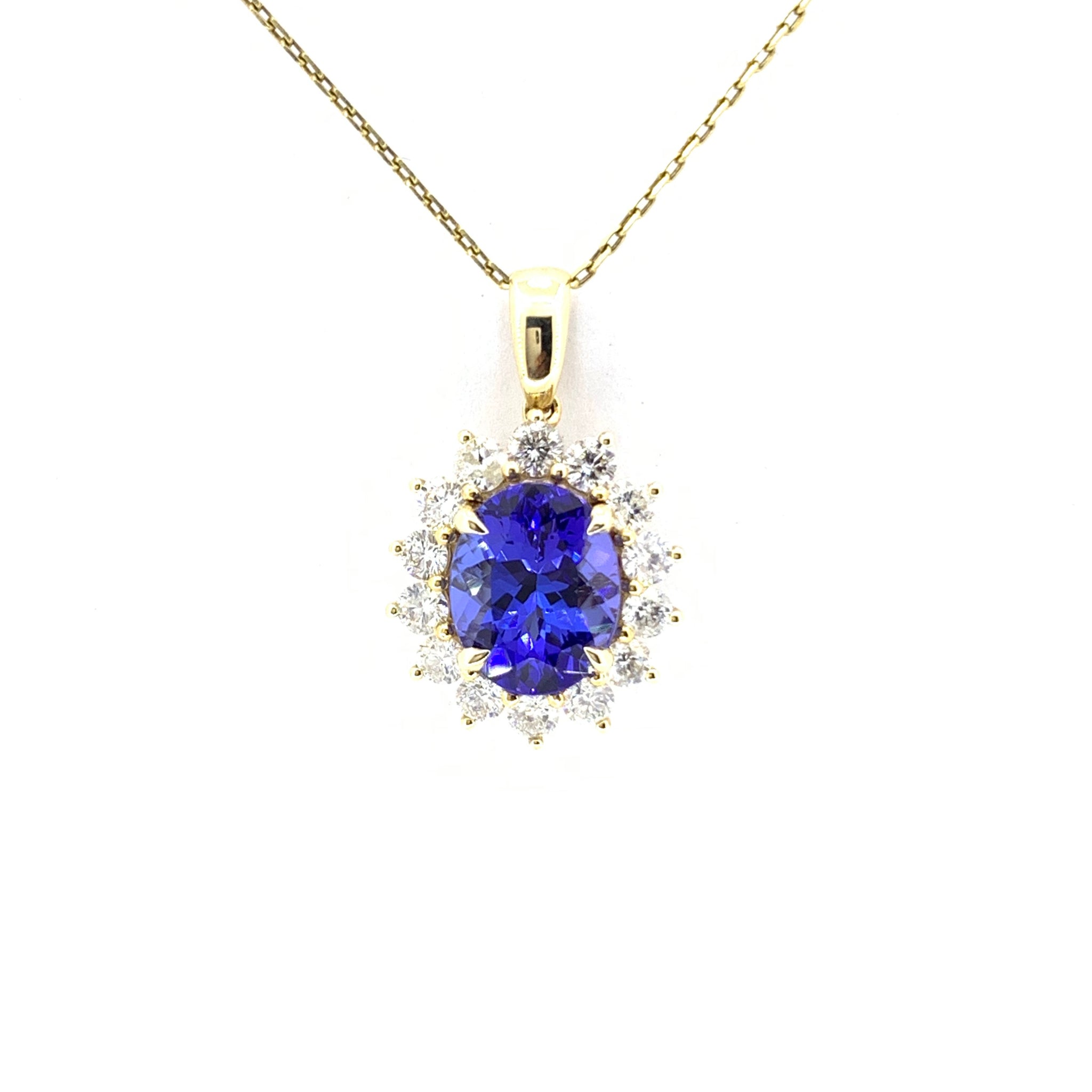 TANZANITE AND DIAMOND HALO PENDANT