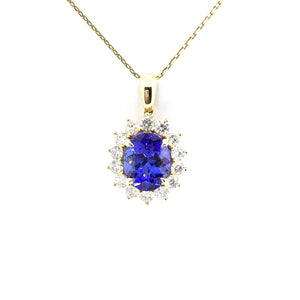TANZANITE AND DIAMOND HALO PENDANT