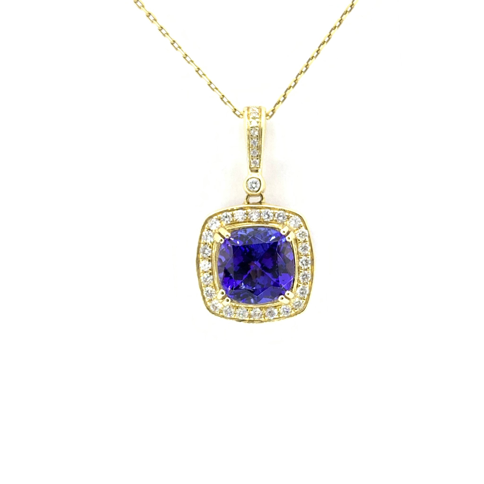TANZANITE AND DIAMOND HALO PENDANT