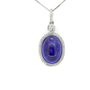 CABOCHON TANZANITE AND DIAMOND HALO PENDANT