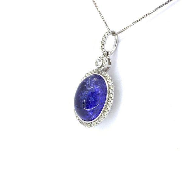 CABOCHON TANZANITE AND DIAMOND HALO PENDANT