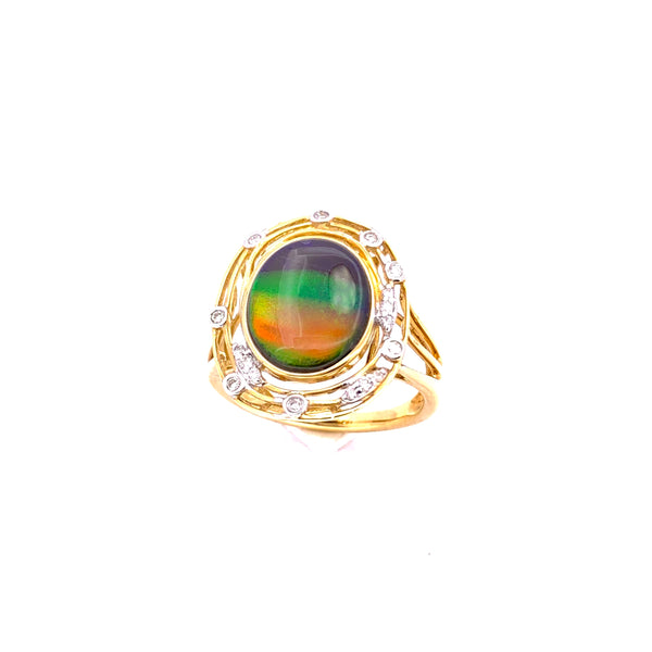 OVAL SHAPE AMMOLITE AND DIAMOND RING