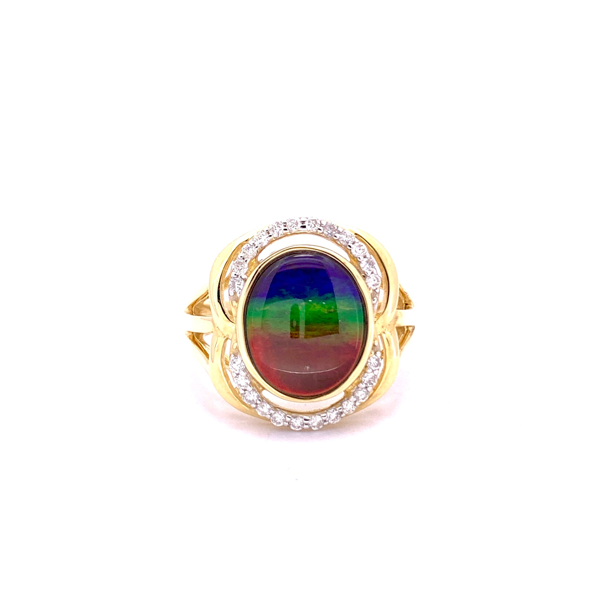 OVAL SHAPE AMMOLITE AND DIAMOND RING