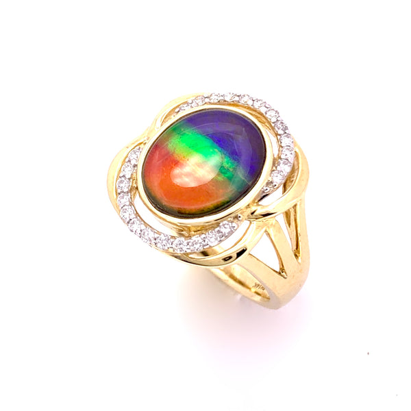 OVAL SHAPE AMMOLITE AND DIAMOND RING
