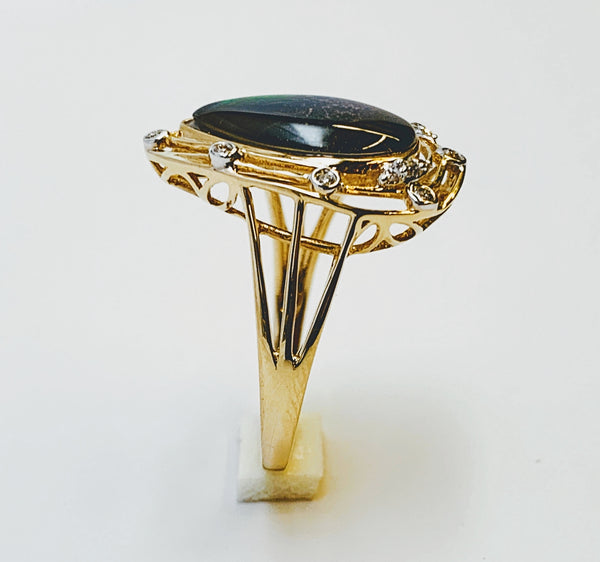 PEAR SHAPE AMMOLITE AND DIAMOND RING